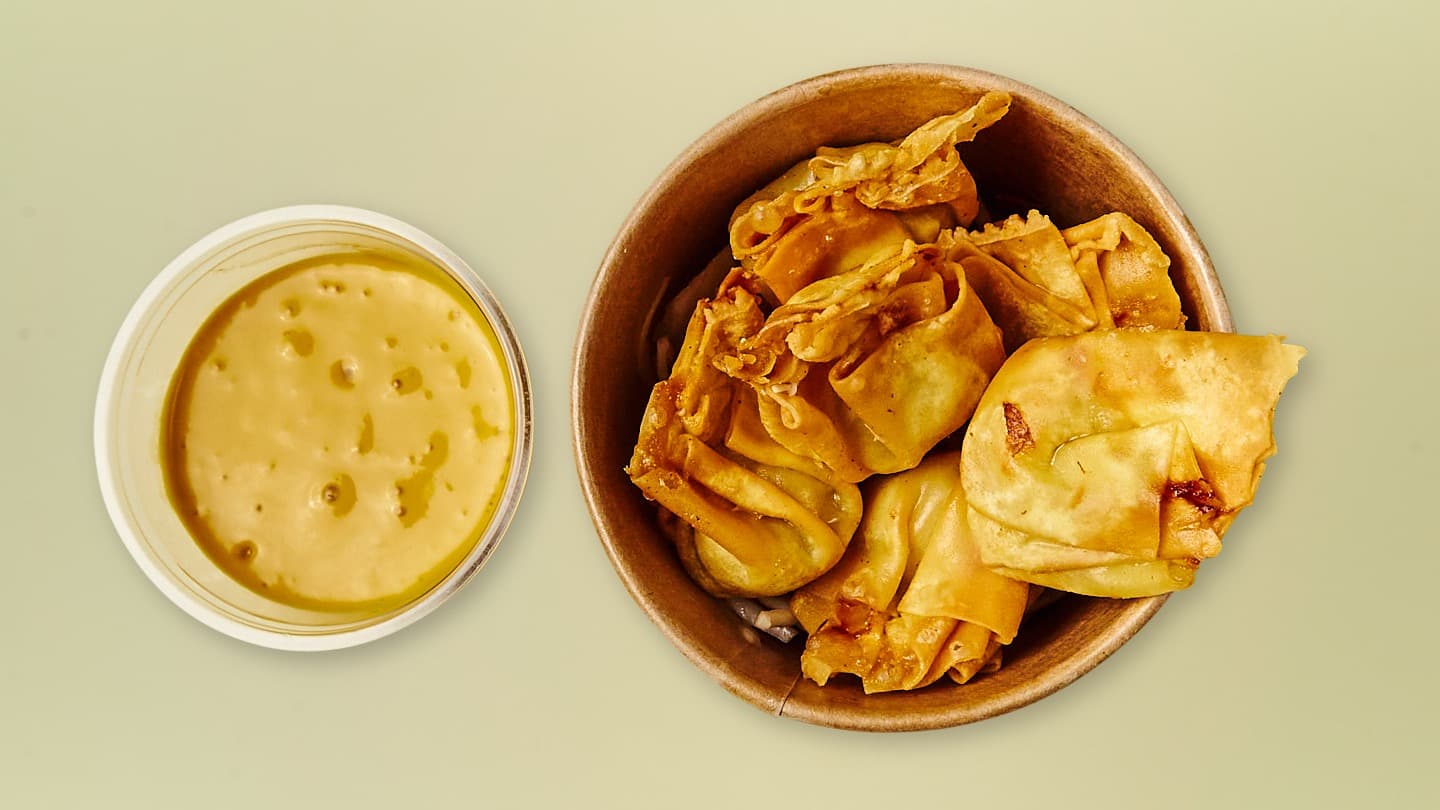 Frittierte Wanton-Täschchen mit Mangosauce